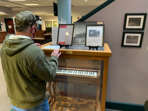 The infamous melodeon, now housed in the library of Midway College